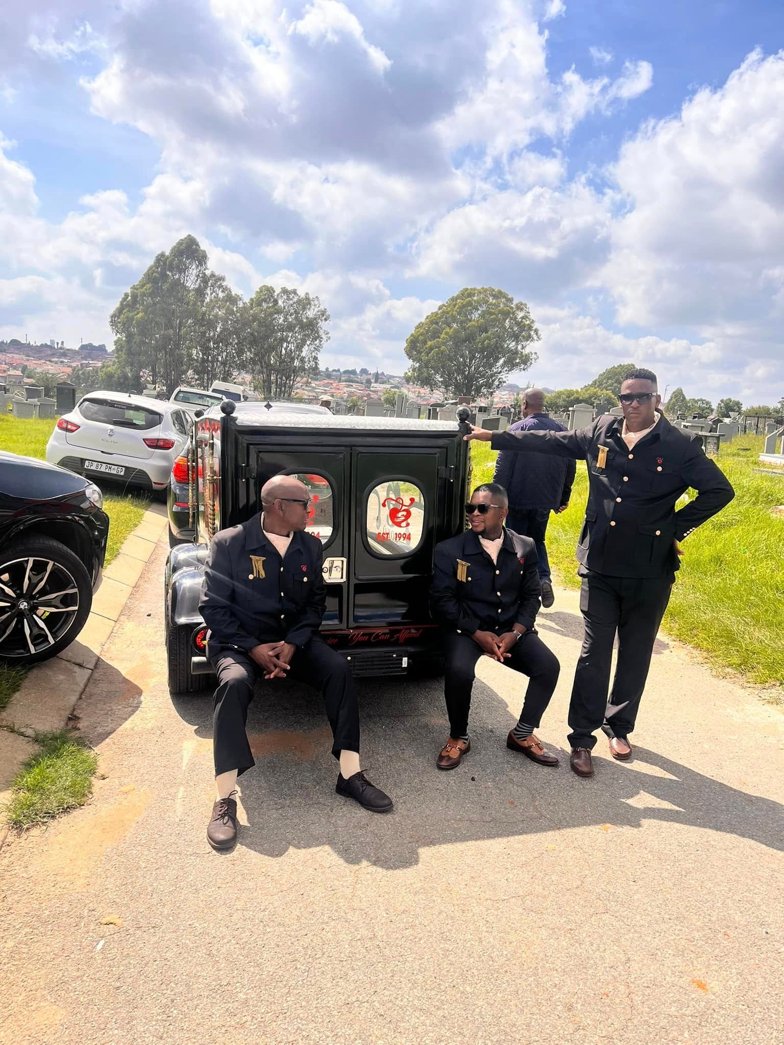 Soko funeral team beside the branded hearse